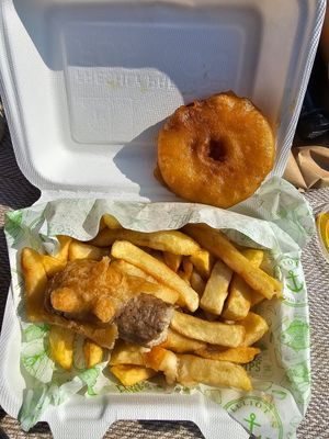 Vegan battered sausage, pineapple fritter and chips. at Elliot's Fish & Chips in Hunstanton