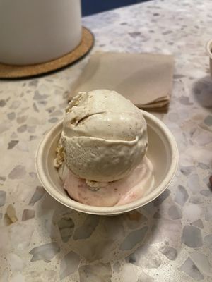 Bottom scoop is white chocolate peppermint and top one is cardamom apple    at Frankie & Jo's - University Village in Seattle