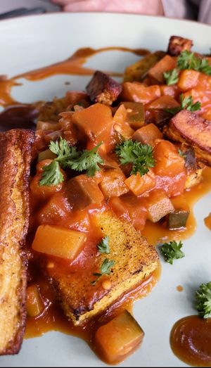 loaded polenta with crunchy tofu sticks ✨  at Planet One in Arbon