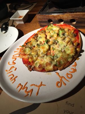 My kid got a pizza on her birthday- a greeting from the Chef at Doa Sen Vang Nha Hang Chay An in Ho Chi Minh City