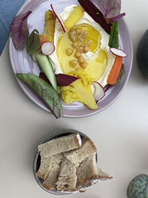 Hummus with bread and pickles  at Glückstein in Mannheim