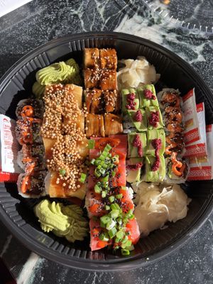 Five different sushi rolls at Wellness Sushi in Denver