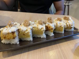tamago natto oshi (torched-pressed sushi) at Wellness Sushi in Denver