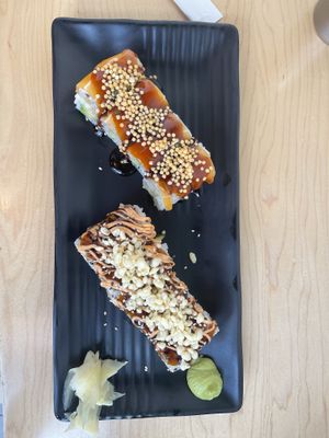 Top: Smokey salmon roll. Bottom: Ebi tempura roll  at Wellness Sushi in Denver