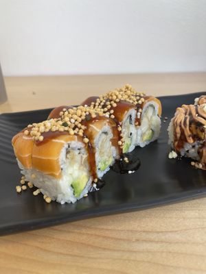 Smokey salmon roll. Really nice subtle Smokey flavor. The salmon has a great texture. Definitely a favorite    at Wellness Sushi in Denver