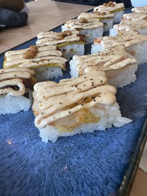 Ebi tempura oshi (front) and natto tamago oshi (back)   at Wellness Sushi in Denver