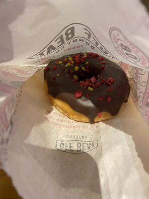brioche donut with chocolate glaze, freeze dried raspberries and pistachio crumbles!  at Offbeat Donut Co in Dublin