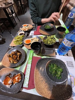 Fried vegetables, vegetable gyozas, vegetable spring rolls, mushrooms, fried tofu, edamame and wakame seaweed salad  at Yi Duo in Barcelona