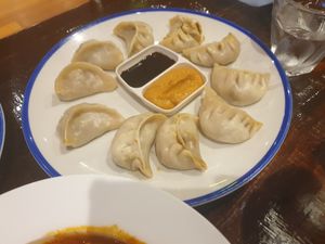 Disappointed with the Momos. Weird curry filling and sauces didn't match. at 8 Sisters Cafe & Grill in Bendigo
