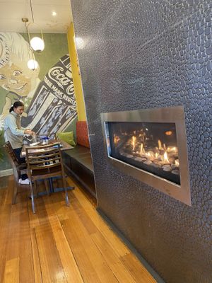 The cosy “fireplace” added atmosphere!   at 8 Sisters Cafe & Grill in Bendigo