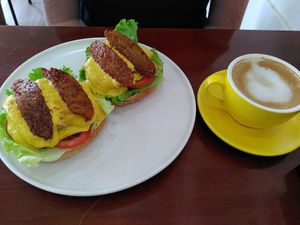 tofu benedict, cappuccino with oatmilk at KURUMI in Da Nang