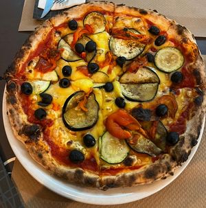 The pizza is delicious and can be veganized: Brought my own vegan cheese to replace the cow cheese (Even without any cheese it would still be very tasty)  at Italianini in Almeria