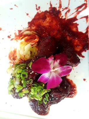 One of my favs--blackberry Chipotle "wings"--tender juicy, crispy skin, beautiful. at Jonny NoBones at the Old Riverhouse Vegan Village in Fort Lauderdale