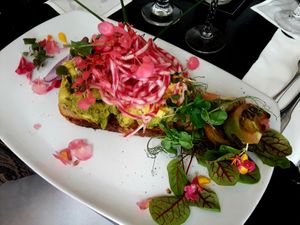 Sky high Avocado toast like no other. at Jonny NoBones at the Old Riverhouse Vegan Village in Fort Lauderdale