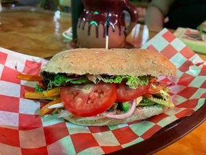 Chorizo and grilled veggies sandwich with hot cocoa at BaoVegan in Cancun