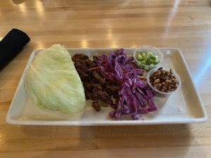 Lettuce cups with unagi sauce over impossible meat with red cabbage, carrots, pecans and scallions  at Magic Tree Pub & Eatery in Boardman