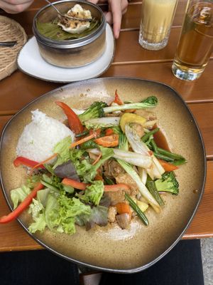 Vegan chicken with rice (bao in the background)  at Comcha Vegan in Berlin