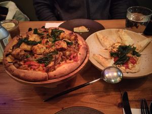 Gongbao inspired pizza and mapo tofu on hummus. at Duli in Shanghai
