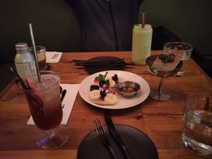 Pancake with fruits and Tiramisu, accompanied by a Christmas inspired cocktail and a banana / avocado smoothie. at Duli in Shanghai