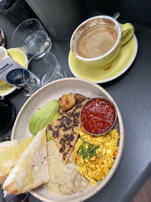  Vegan breakfast with oat milk cappuccino  at Bakers & Roasters in Amsterdam