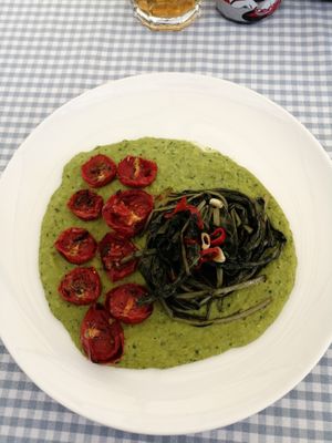 Fava bean cream with chicory and cherry tomatoes  at Bistro Miranda in Orvieto