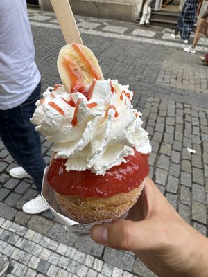 Vegan chimney cake with strawberry jam, bananas and soy whipped cream   at Sweet Dreams in Prague