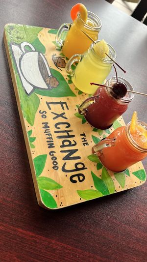 Mimosa flight : peach, pineapple, pomegranate & blood orange   at The Exchange in Colorado Springs