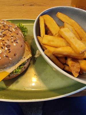 Zeitgeist burger and golden fries at Hans Im Glück - Mercedes Platz in Berlin