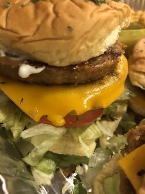 Cheez burger dinner with fries and deviled eggs  at Quannies Vegan Dishes  in Fort Lauderdale