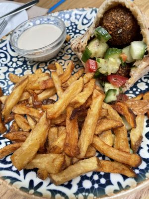 Falafel pita with fries  at Mazel Tov in Budapest