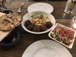 Hummus plate with falafel and tabouleh    at Mazel Tov in Budapest