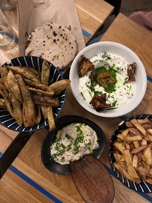 Za’atar breadsticks (Made of deep fried pita), babaganoush & labneh   at Mazel Tov in Budapest