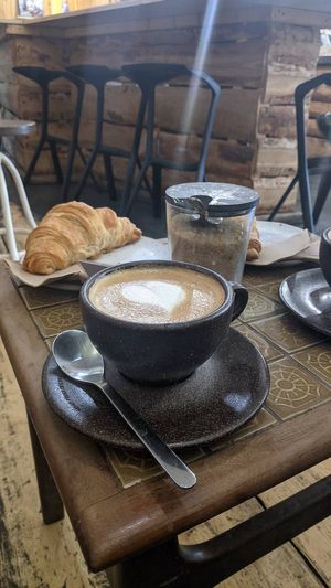Coffee with vegan croissant at Oslo Kaffebar in Berlin