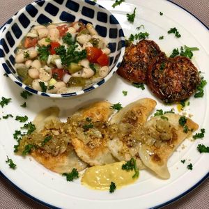 Polish Brunch: Vegan Mushroom and Cabbage Pierogis dusted with Walnut-Rosemary Crumble, Slow Roasted Garlic Tomatoes, side of Cannellini Bean and Pickle Salad at Momma Noodles - Pop Up in Zushi