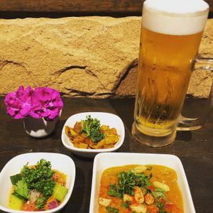 Spicy African Stew Otsumami Drink Set: 

~Sierra Leonean Groundnut Stew with brown rice

~Side of Tanzanian Kachumbari fresh lemon garden salad 

~Ethiopian Ingudai Tibs  at Momma Noodles - Pop Up in Zushi