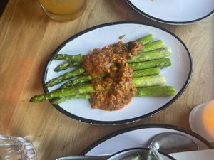 Asparagus with tomato sauce  at Shy Bird in Cambridge