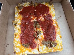 Vegan pizza under different lighting  at Satch Squared in Gainesville