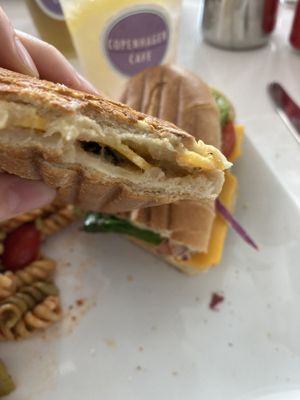 I almost forgot to take a picture of my food, so this is the half eaten sandwich 😂  at Copenhagen Café in Tarpon Springs