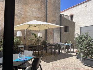 Interior  outdoor dining space  at Bastione & Costanza in Cefalu