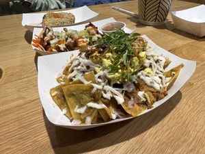 Chilaquiles verde, buffalo flower tacos, street corn  at Jajaja Mexicana - Hudson Yards in New York City
