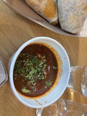 Birria tacos dipping sauce  at Jajaja Mexicana - Hudson Yards in New York City