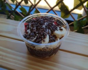 Snickers Pls Bowl with a chocolate açaí base (vegan) at Delicia Acai + Protein Bar in Brunswick East