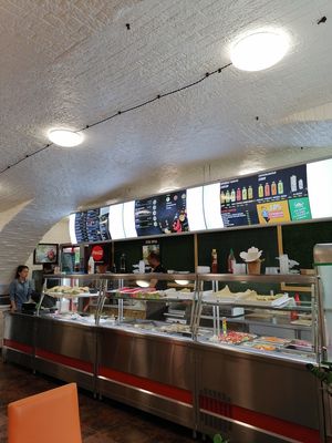 Кафе находится в цокольном этаже старого здания at Vegan Piramida - Веган Пирамида in St Petersburg