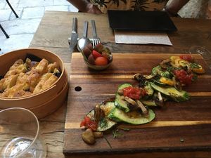 First course: Homemade olive bread with zucchini and tomatoes at Ko doma in Hvar