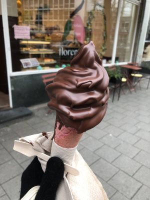 Vegan soft serve on a cone with chocolate dip.  at Florentina in Rotterdam