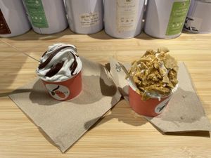 Small cups with chocolate caramel and “honey”comb toppings  at Florentina in Rotterdam