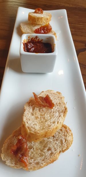 Slightly roasted bread with tomato concasse served with awazè😋 at Addis Kitchen in South East London