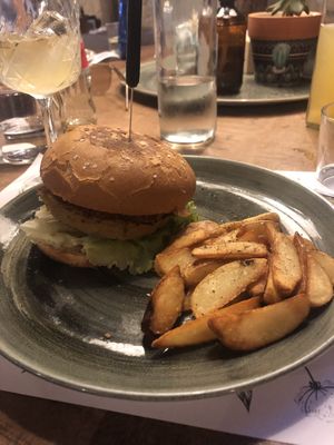 The vegan burger with a glass of Tiki sangria   at The Yard in Parga