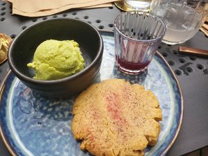 Avocado sorbet and traditional cookie at La Bartola in Toronto