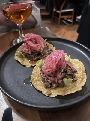 Mushroom tostadas - very good! Lots of pickled flavours   at La Bartola in Toronto